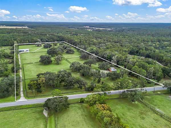 24.2 Acres of Agricultural Land with Home for Sale in Fort McCoy, Florida