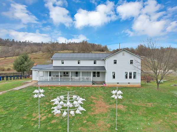 24.9 Acres of Recreational Land with Home for Sale in Quaker City, Ohio