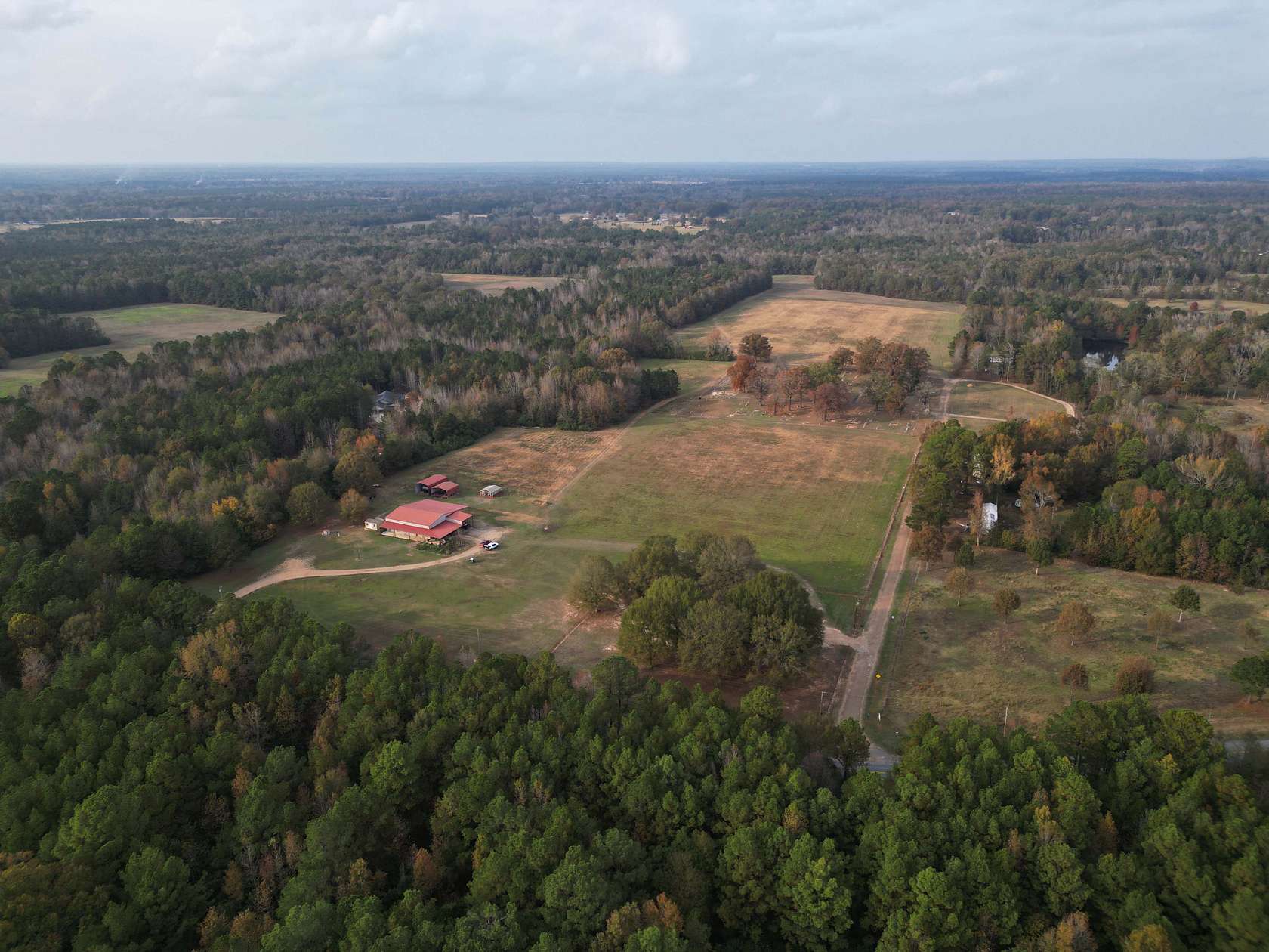 76.7 Acres of Land with Home for Sale in Fouke, Arkansas