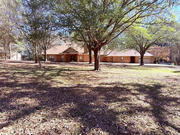 6.47 Acres of Residential Land with Home for Sale in Pittsburg, Texas