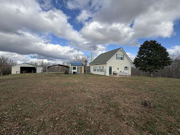 10 Acres of Land with Home for Sale in Hohenwald, Tennessee