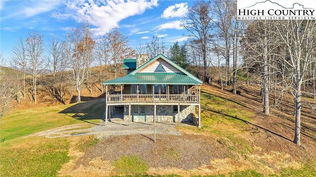 3.1 Acres of Residential Land with Home for Sale in Grassy Creek, North Carolina