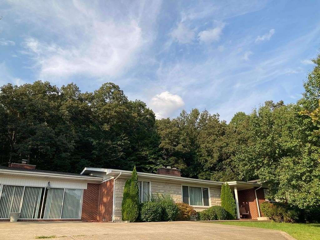 2.3 Acres of Residential Land with Home for Sale in Pikeville, Kentucky