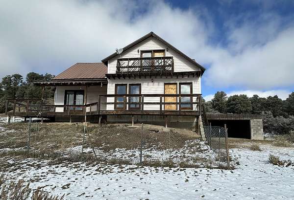 3 Acres of Residential Land with Home for Sale in Regina, New Mexico