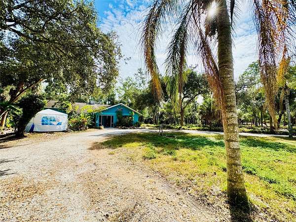 3 Acres of Residential Land with Home for Sale in North Port, Florida