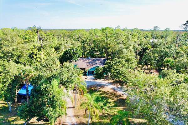 3 Acres of Residential Land with Home for Sale in North Port, Florida
