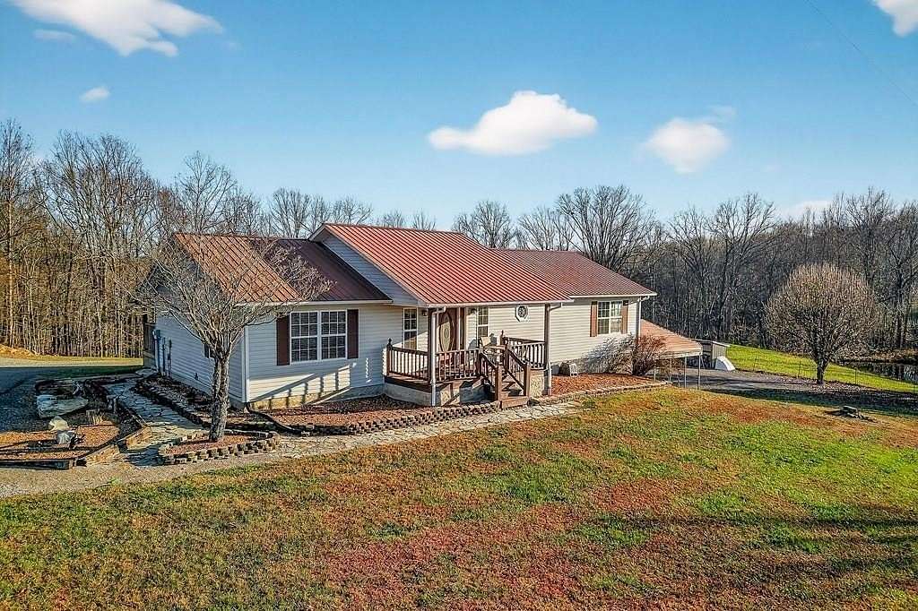12.7 Acres of Land with Home for Sale in Hilham, Tennessee