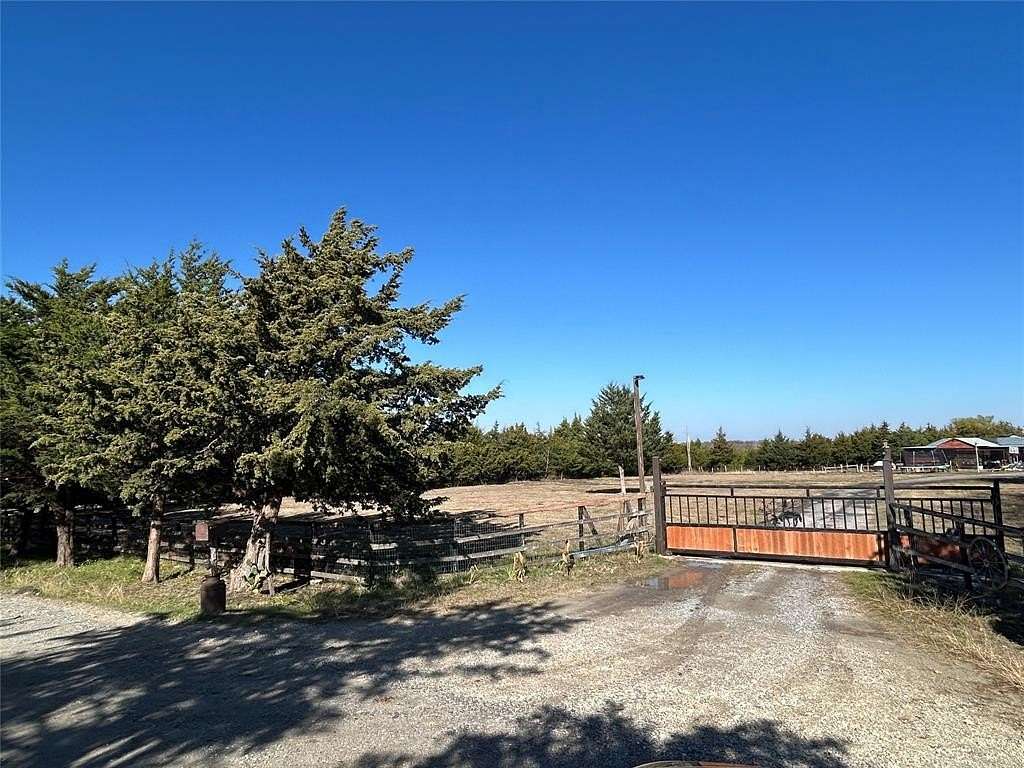 28.3 Acres of Land with Home for Sale in Wolfe City, Texas