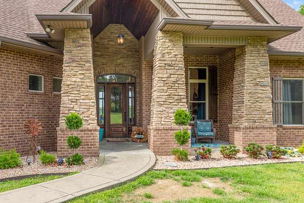 6.44 Acres of Land with Home for Sale in Bon Aqua, Tennessee