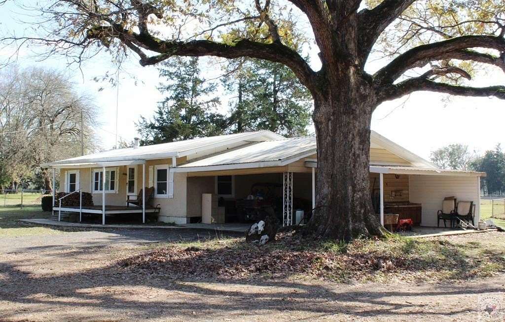 91.3 Acres of Land with Home for Sale in Avery, Texas