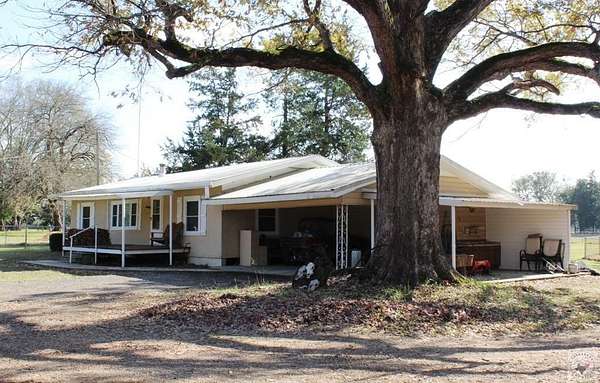 91.3 Acres of Land with Home for Sale in Avery, Texas