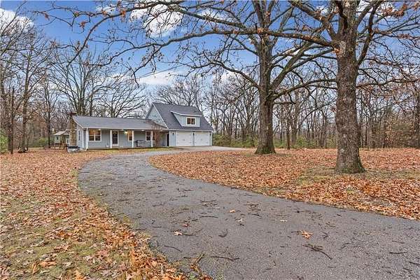 5 Acres of Residential Land with Home for Sale in Gravette, Arkansas