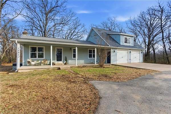 5 Acres of Residential Land with Home for Sale in Gravette, Arkansas