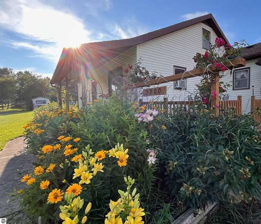 5 Acres of Residential Land with Home for Sale in Kingsley, Michigan