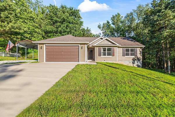 1.79 Acres of Residential Land with Home for Sale in Waverly, Tennessee