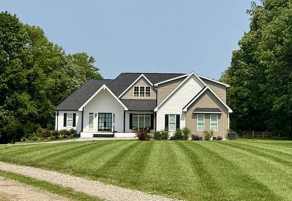 20.4 Acres of Recreational Land with Home for Sale in Cottontown, Tennessee