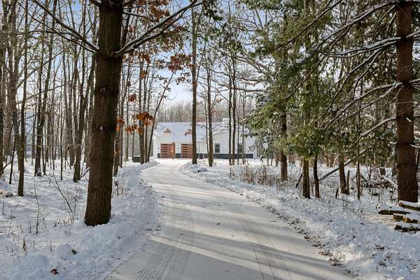 5 Acres of Residential Land with Home for Sale in Alto, Michigan