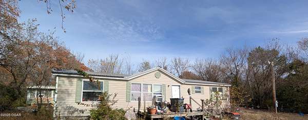 2 Acres of Residential Land with Home for Sale in Joplin, Missouri