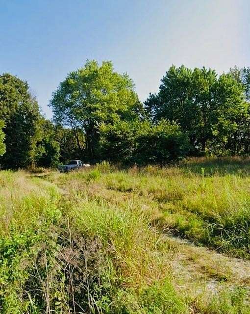 2 Acres of Residential Land with Home for Sale in Gravette, Arkansas