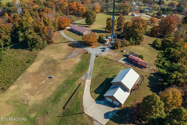 8.25 Acres of Residential Land with Home for Auction in Louisville, Tennessee