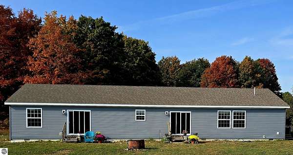 10.3 Acres of Land with Home for Sale in Alden, Michigan