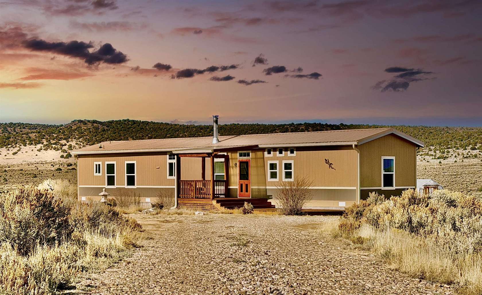 10 Acres of Residential Land with Home for Sale in Carson, New Mexico