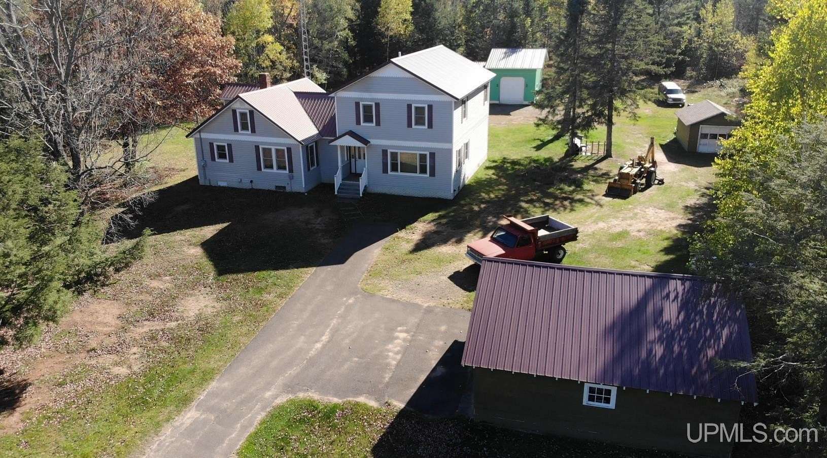 12 Acres of Recreational Land with Home for Sale in Trout Creek, Michigan