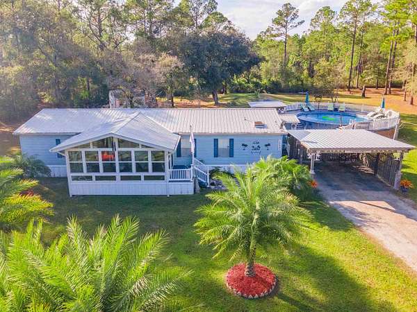 3.4 Acres of Residential Land with Home for Sale in Hastings, Florida