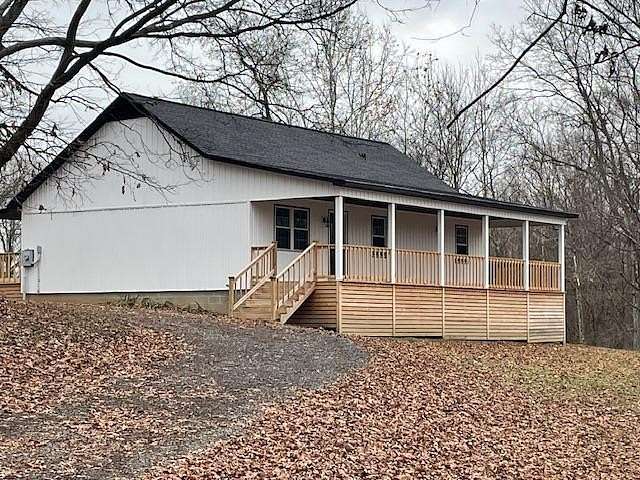 22 Acres of Land with Home for Sale in McKenzie, Tennessee