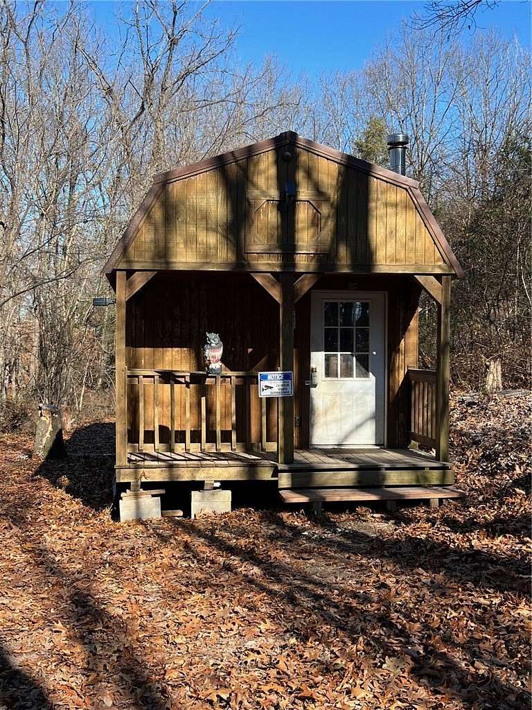 14.6 Acres of Recreational Land with Home for Sale in Omaha, Arkansas