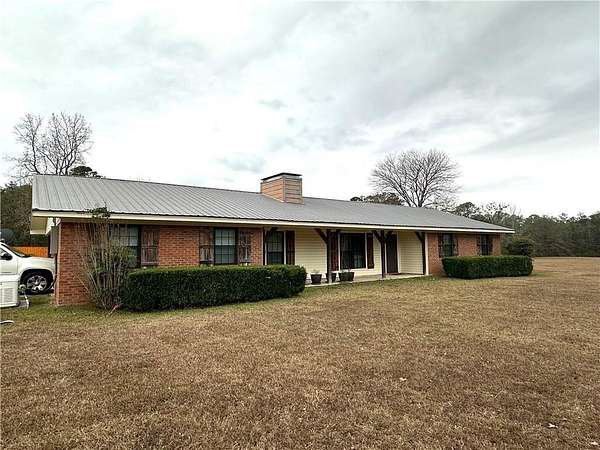 21.5 Acres of Recreational Land with Home for Sale in Opelika, Alabama