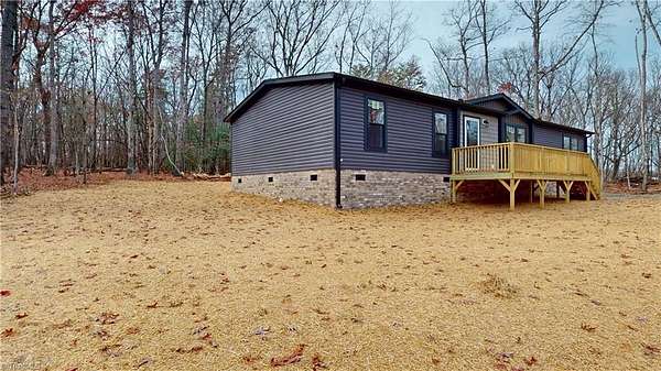 3.5 Acres of Land with Home for Sale in State Road, North Carolina