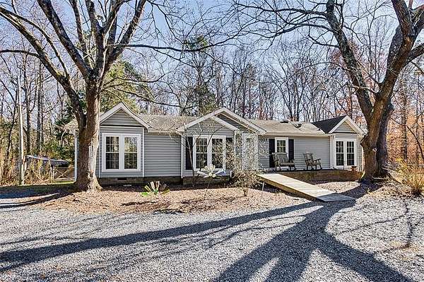 5 Acres of Residential Land with Home for Sale in Ramseur, North Carolina