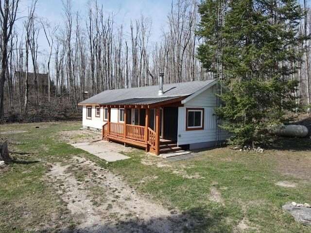 5 Acres of Land with Home for Sale in Boyne Falls, Michigan