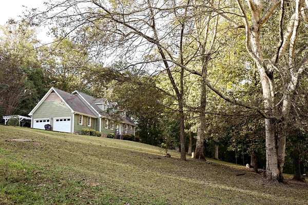 7.66 Acres of Land with Home for Sale in Russellville, Alabama