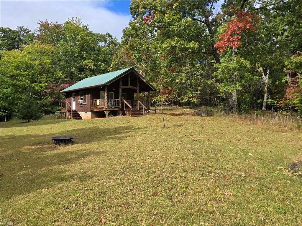 31.3 Acres of Recreational Land with Home for Sale in Purlear, North Carolina