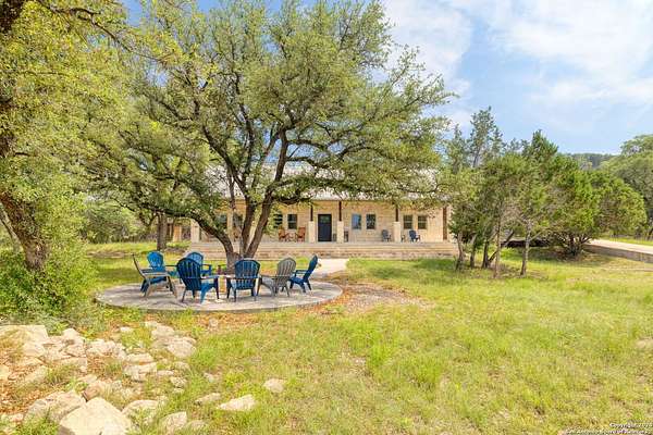 11.2 Acres of Land with Home for Sale in Concan, Texas