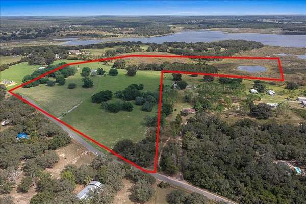 38.6 Acres of Agricultural Land with Home for Sale in Umatilla, Florida