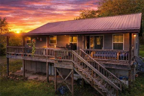 20 Acres of Land with Home for Sale in Berryville, Arkansas