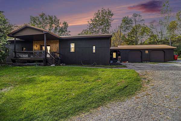 5.33 Acres of Land with Home for Sale in Grant, Michigan