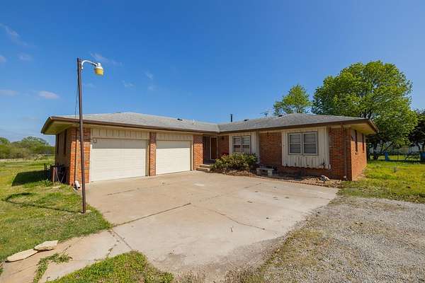 5.4 Acres of Residential Land with Home for Auction in Augusta, Kansas