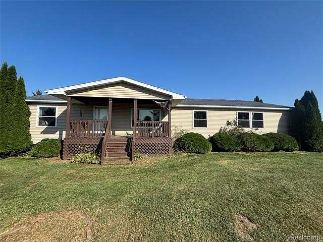 2.55 Acres of Land with Home for Sale in Brown City, Michigan
