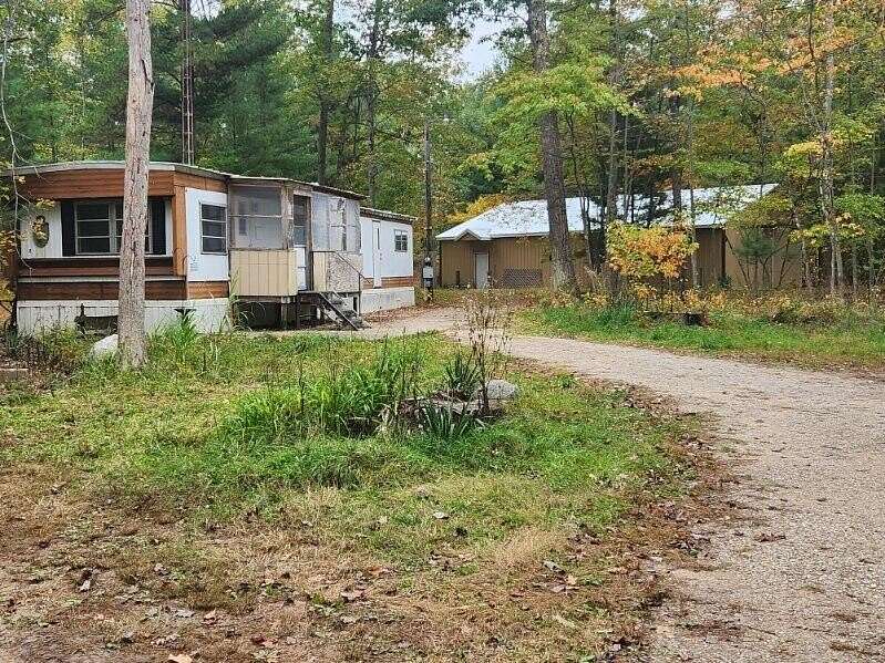 34.4 Acres of Recreational Land with Home for Sale in Free Soil, Michigan