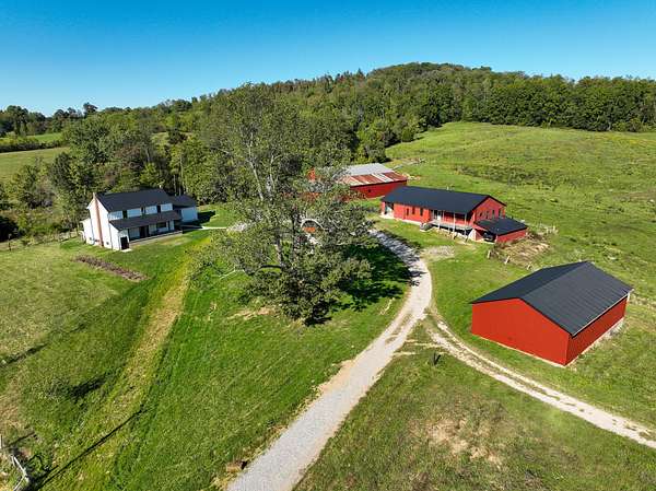 78.7 Acres of Land with Home for Sale in Liberty, Kentucky