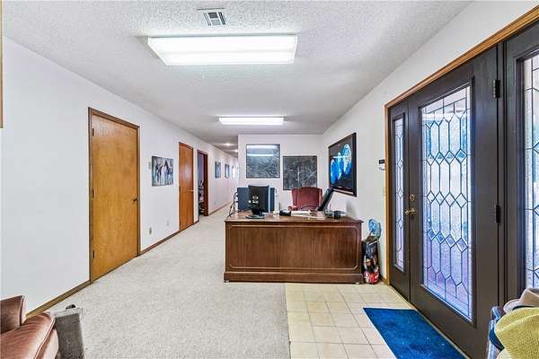 2.44 Acres of Land with Home for Sale in Rogers, Arkansas