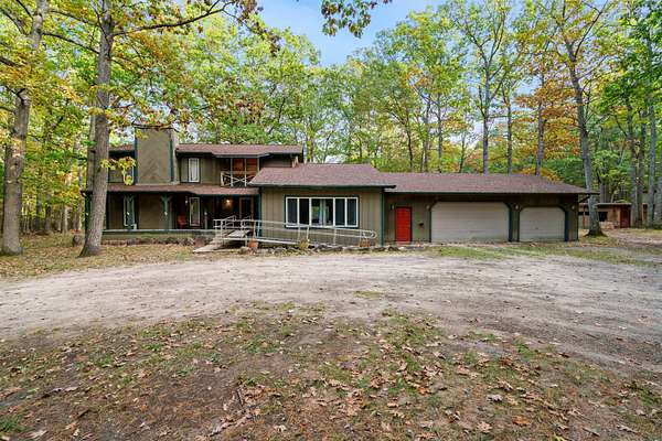 13 Acres of Land with Home for Sale in Indian River, Michigan