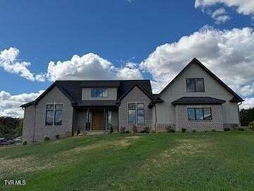 5 Acres of Residential Land with Home for Sale in Piney Flats, Tennessee