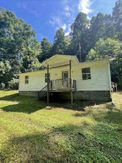 9.27 Acres of Residential Land with Home for Auction in St. Paul, Virginia