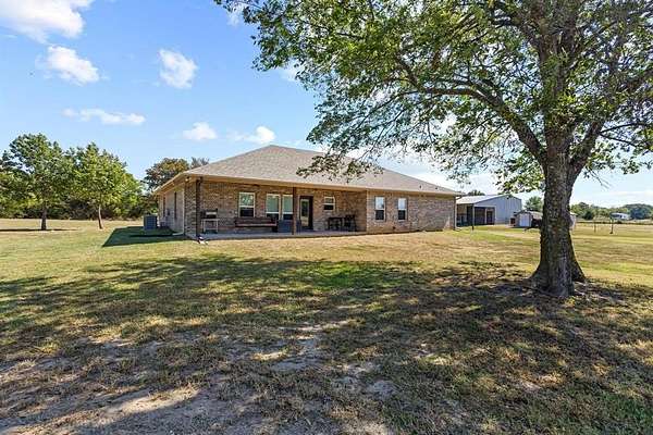 10 Acres of Land with Home for Sale in Honey Grove, Texas