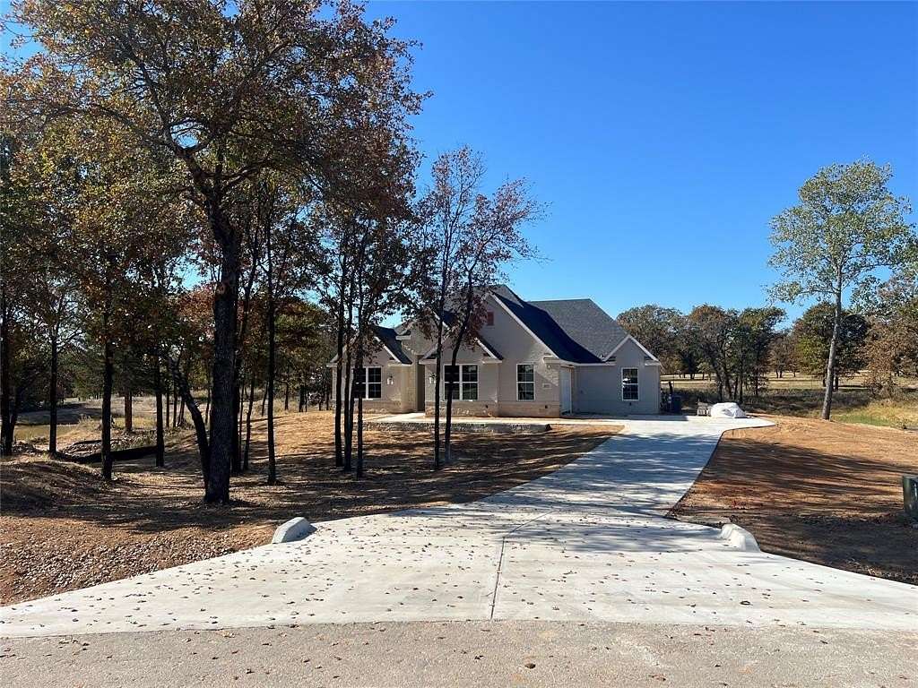 2 Acres of Residential Land with Home for Sale in Poolville, Texas